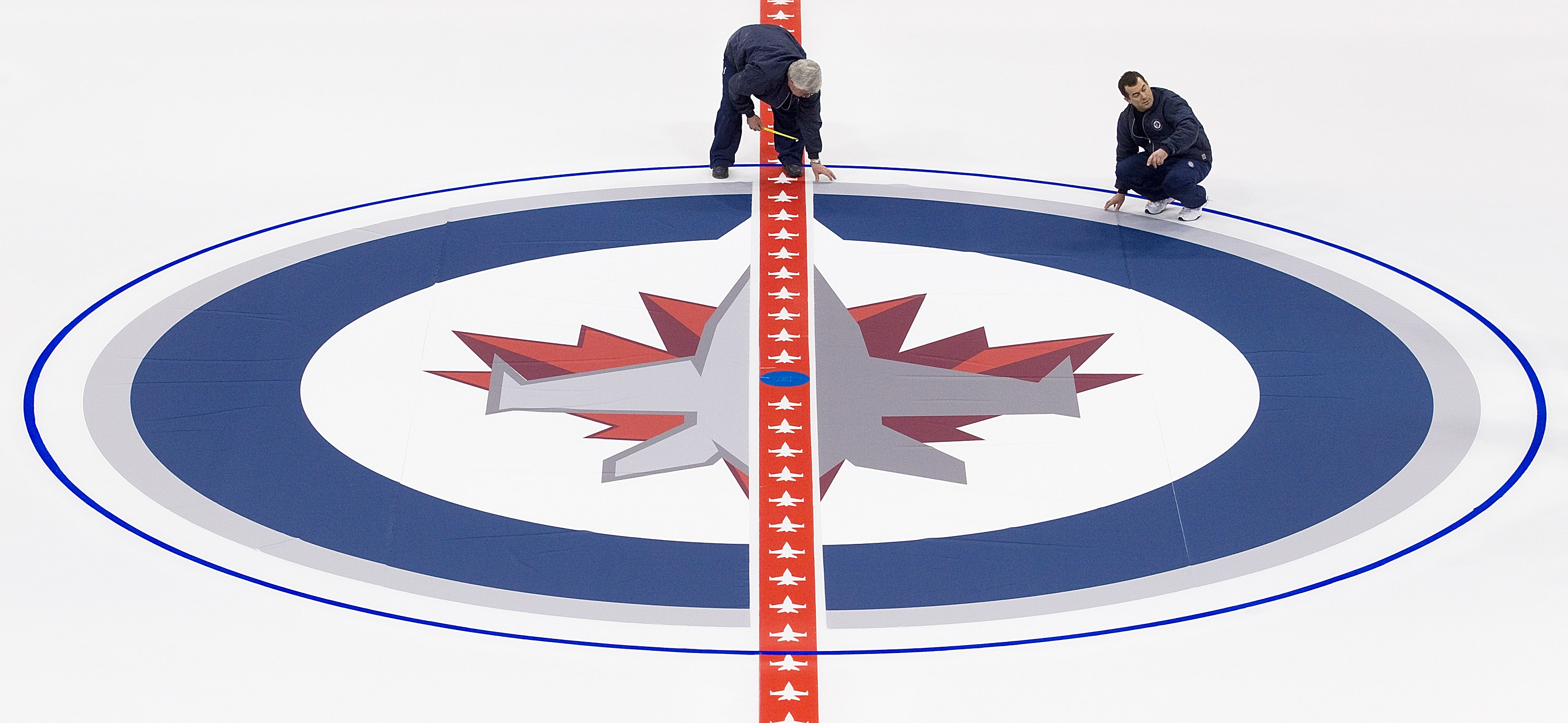 Winnipeg Jets Install Logo And Lines In MTS Centre Ice